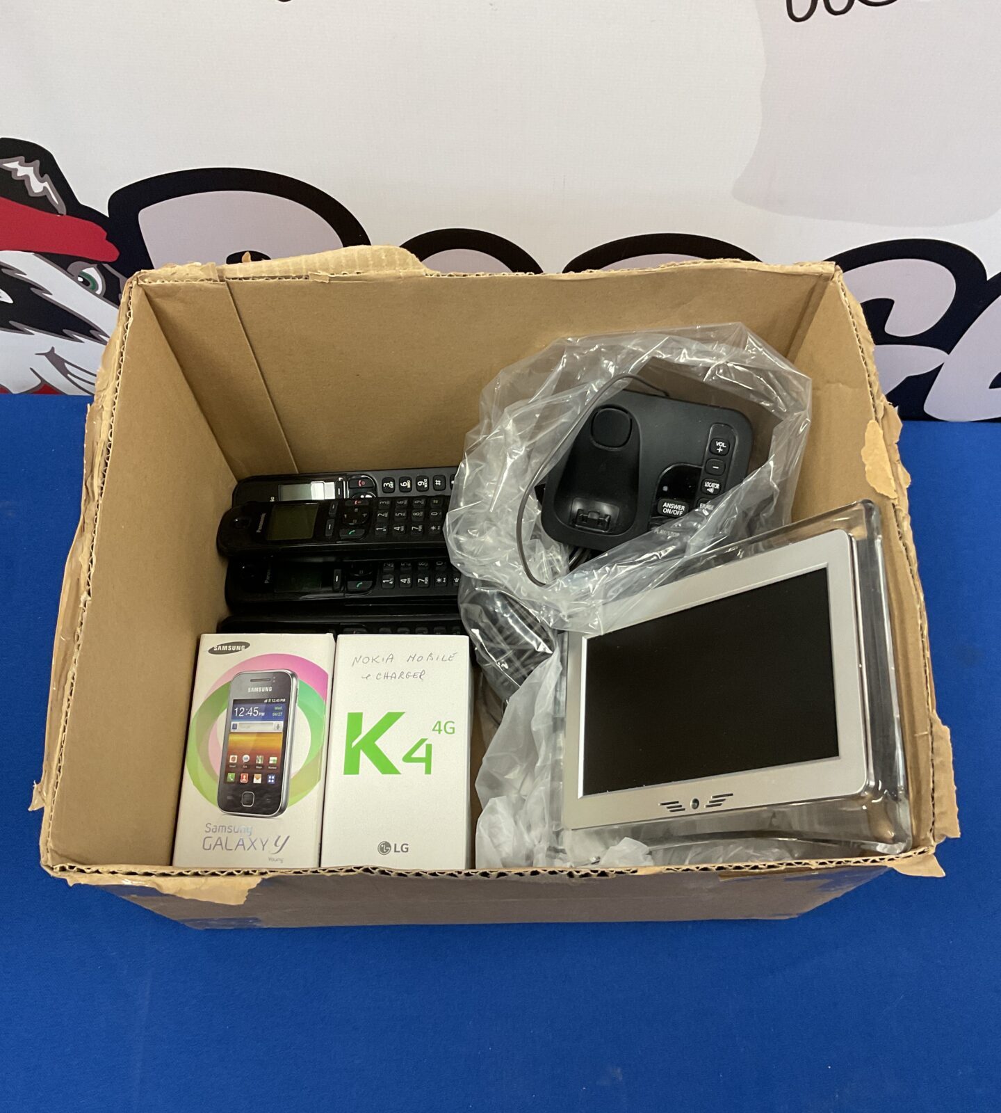 Box of mobile & house phones including samsung