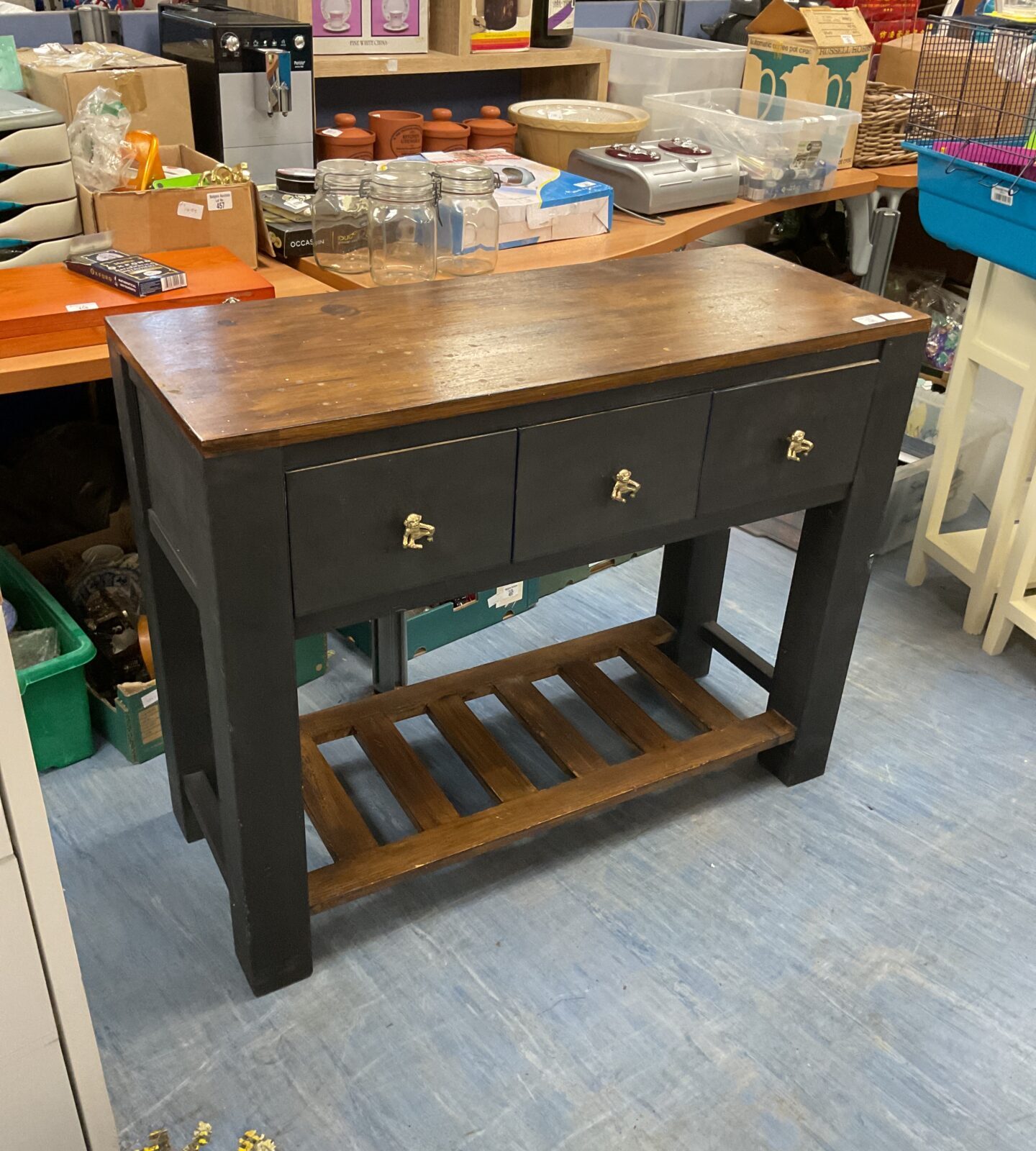 Three draw console table with brass monkey draw nobs