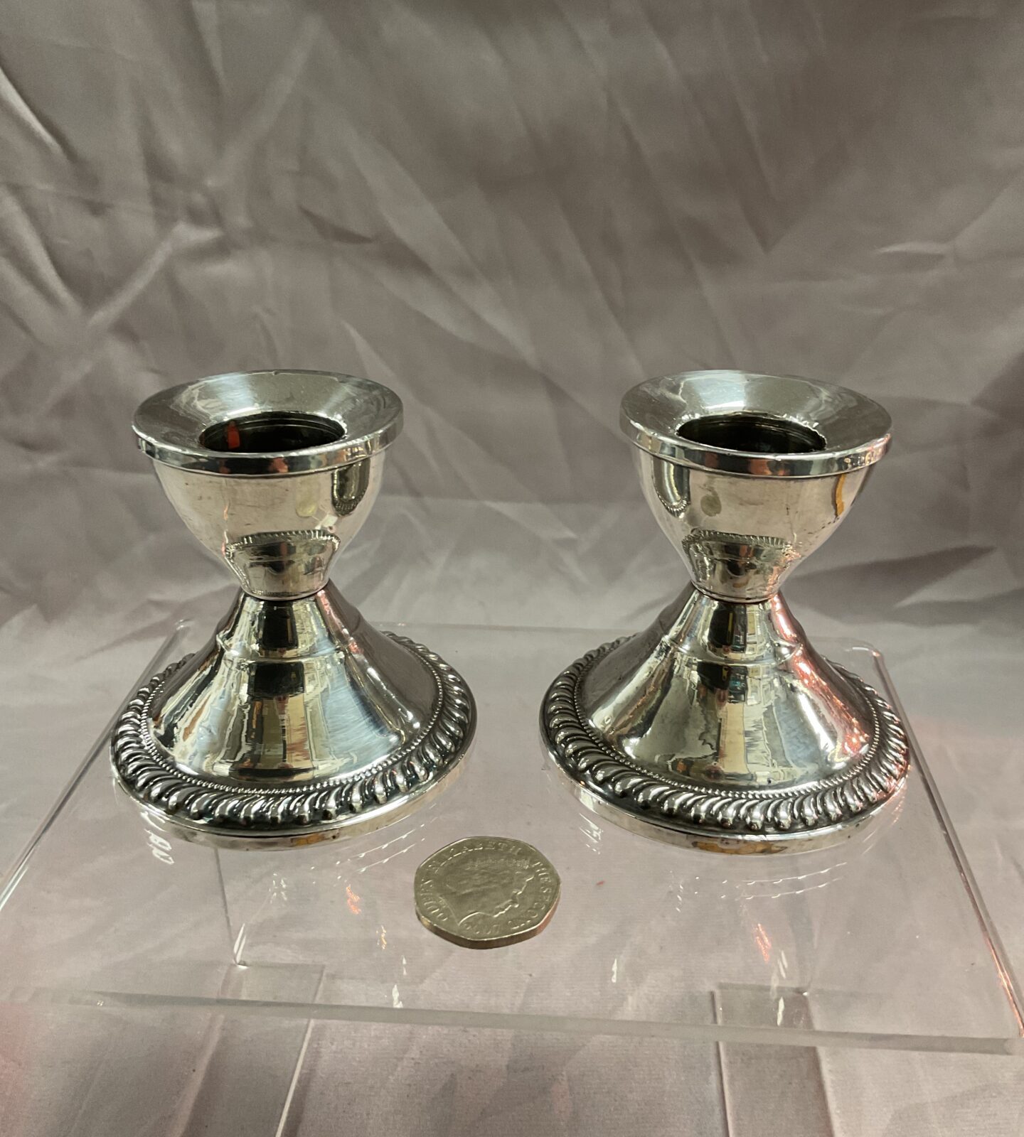 Pair of sterling silver weighted candlesticks 187.5 g gross