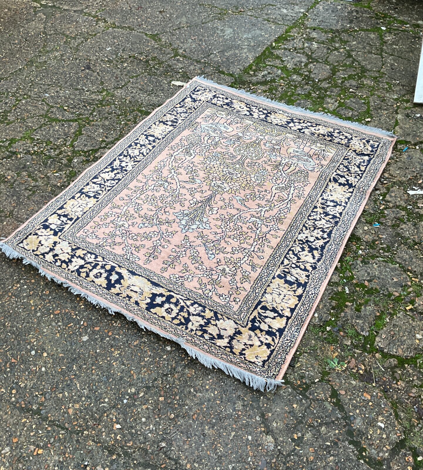 Floral patterned pink and blue rug