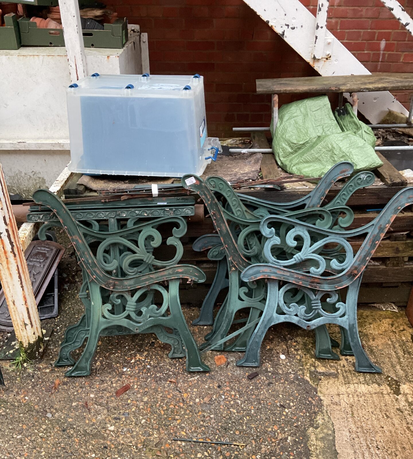 Three pairs of cast iron bench ends & pair of table ends