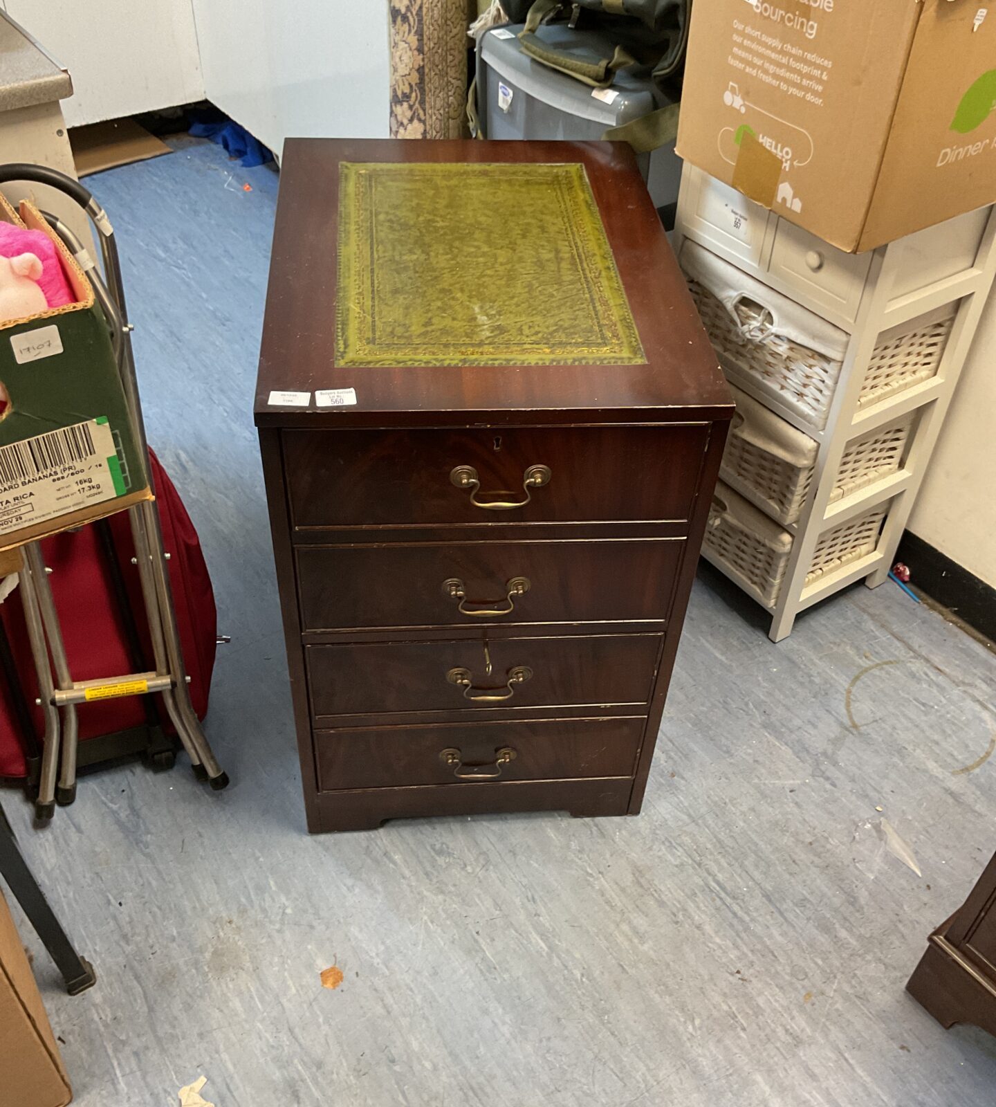 Leather topped chest of draws