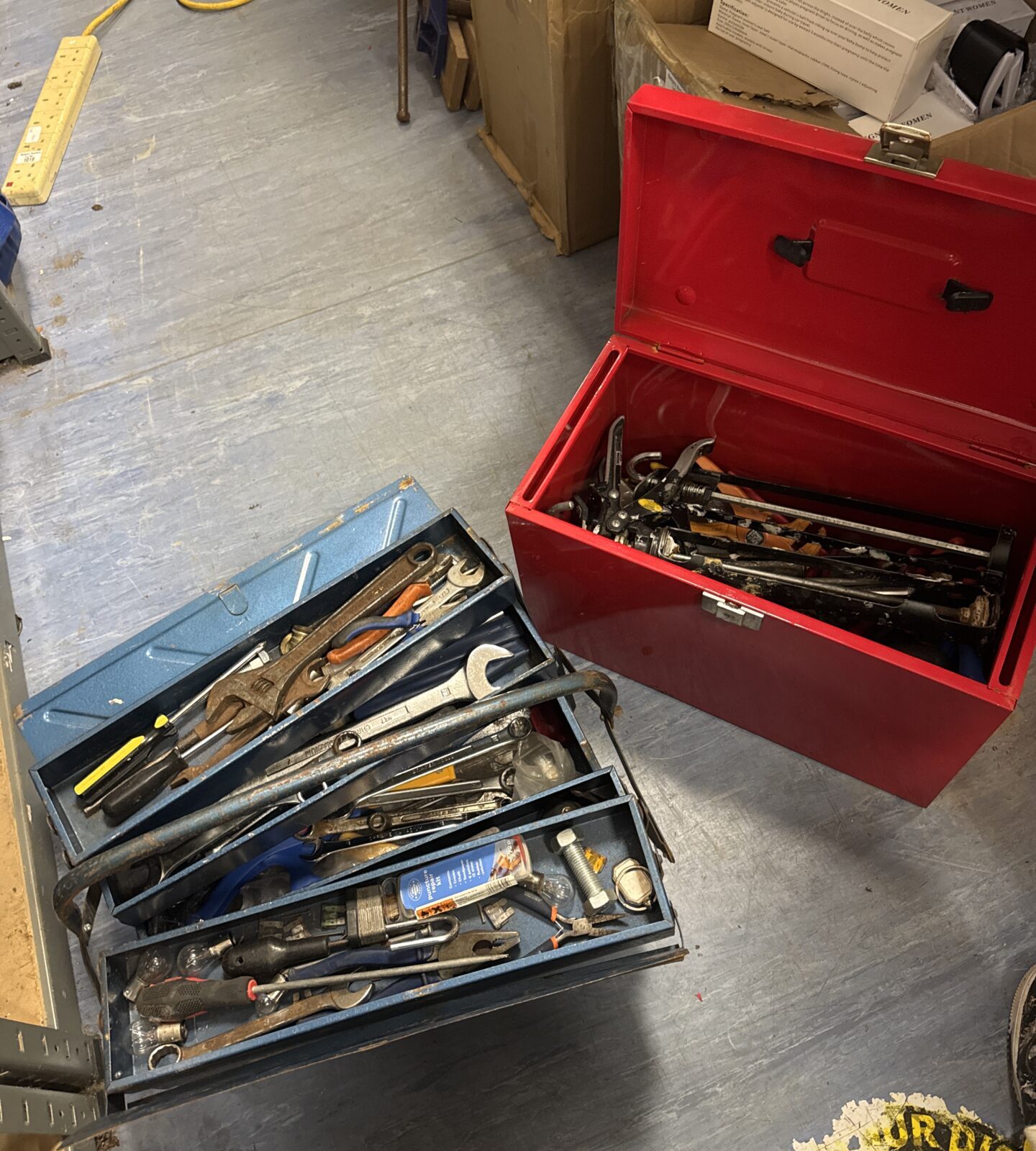 Two metal toolboxes with contents