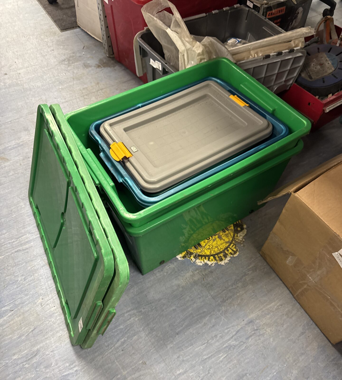 Selection of plastic storage containers with some lids