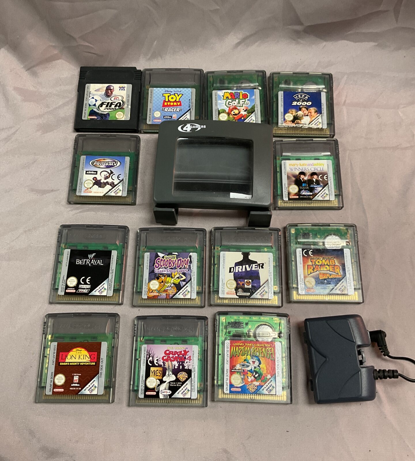 Collection of Gameboy games  Color magnifying window and battery power pack