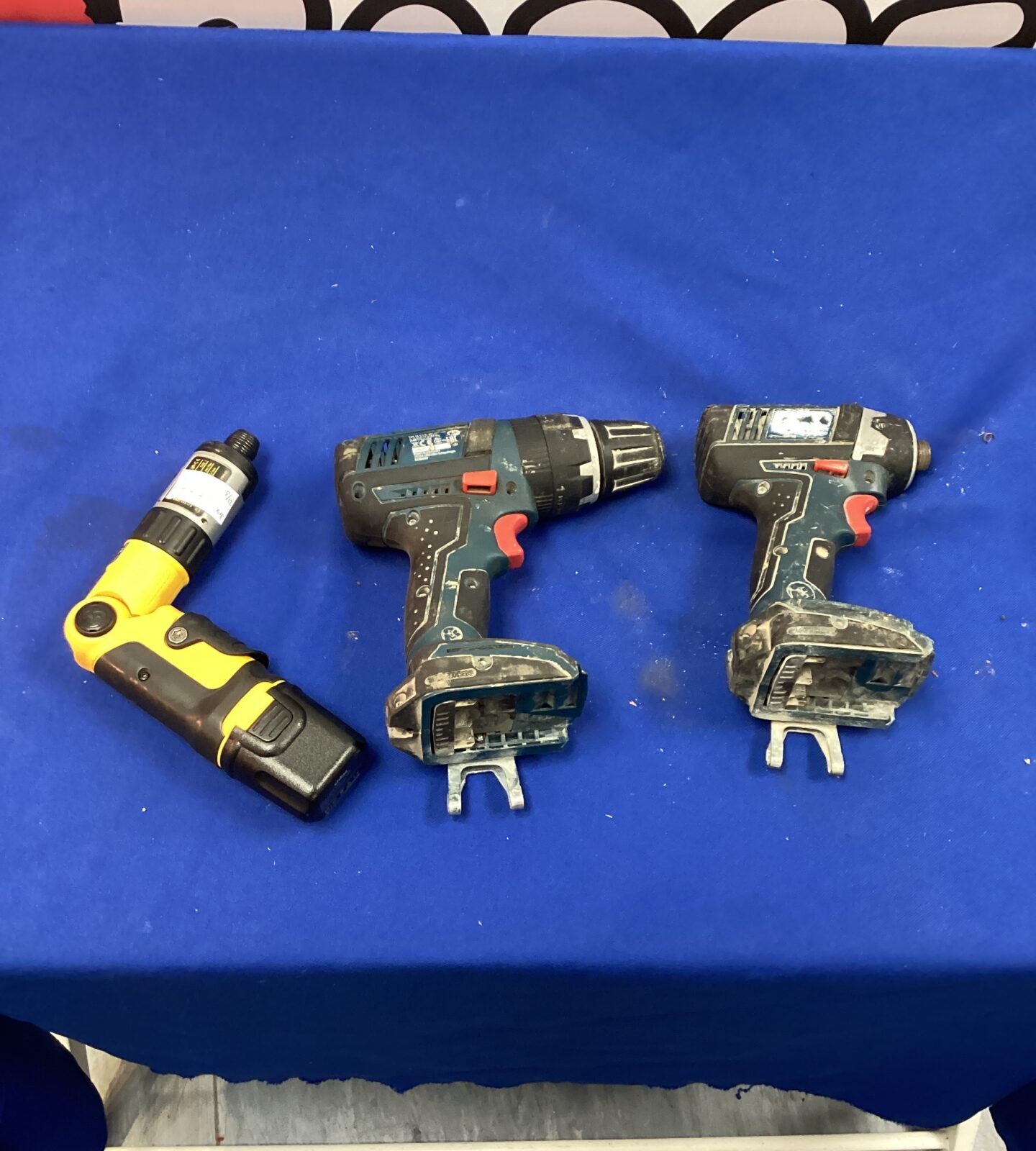 Three battery drills for repair