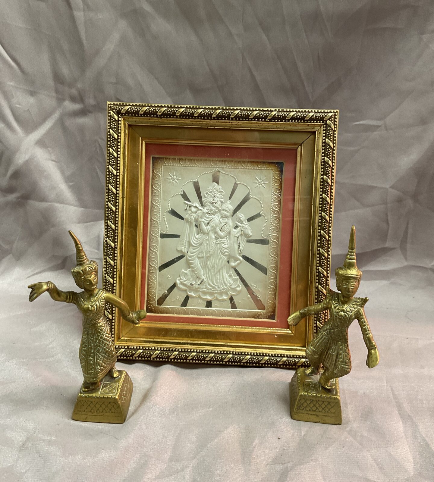 Two brass Thai Siamese dancers and gilt framed picture