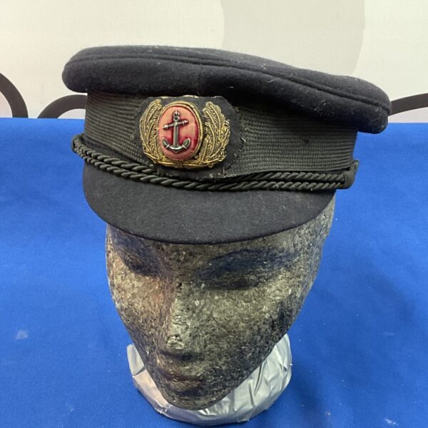 Vintage WW2 Merchant Navy officer’s cap with badge.