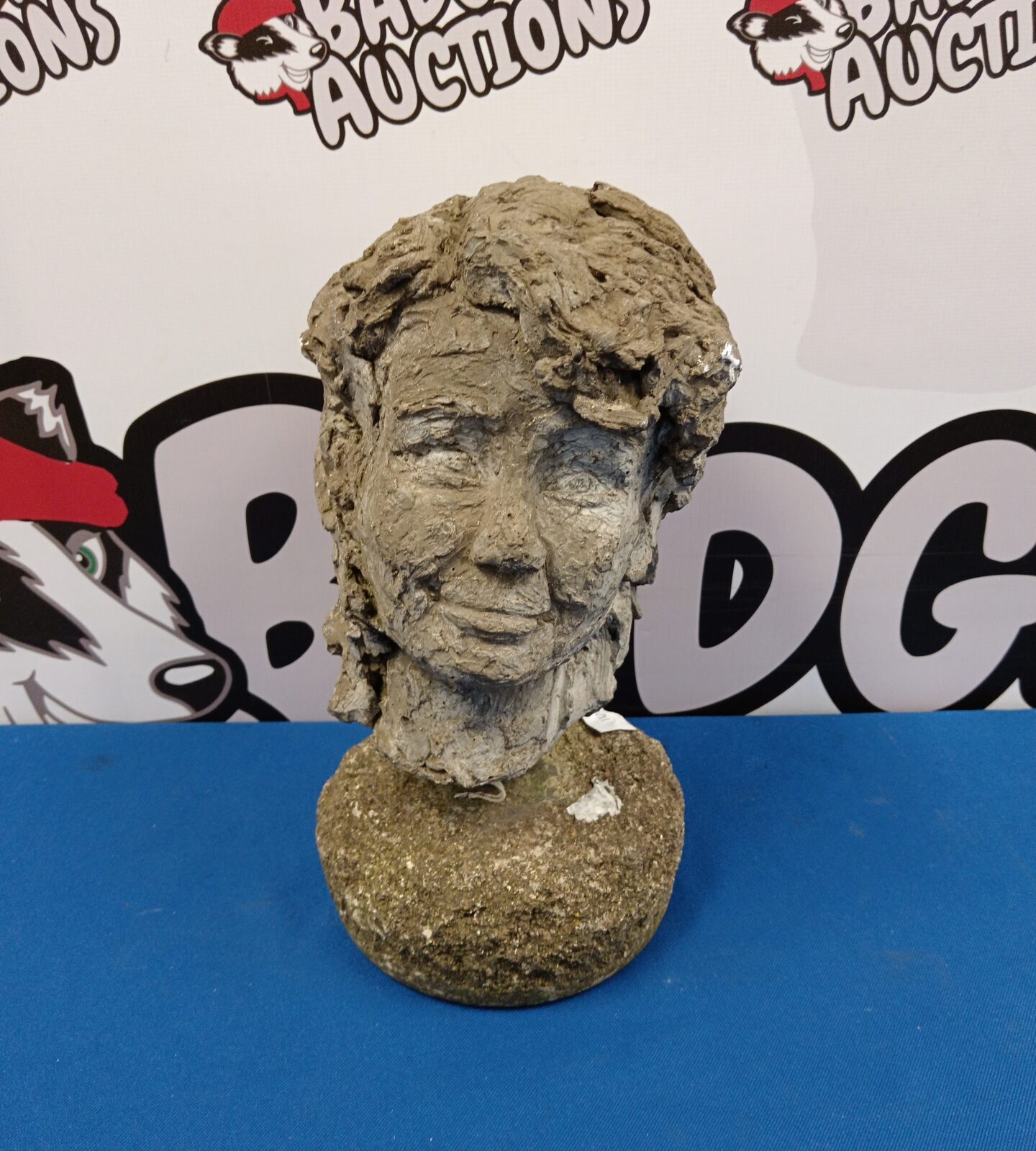 Reconstituted stone bust of a young child