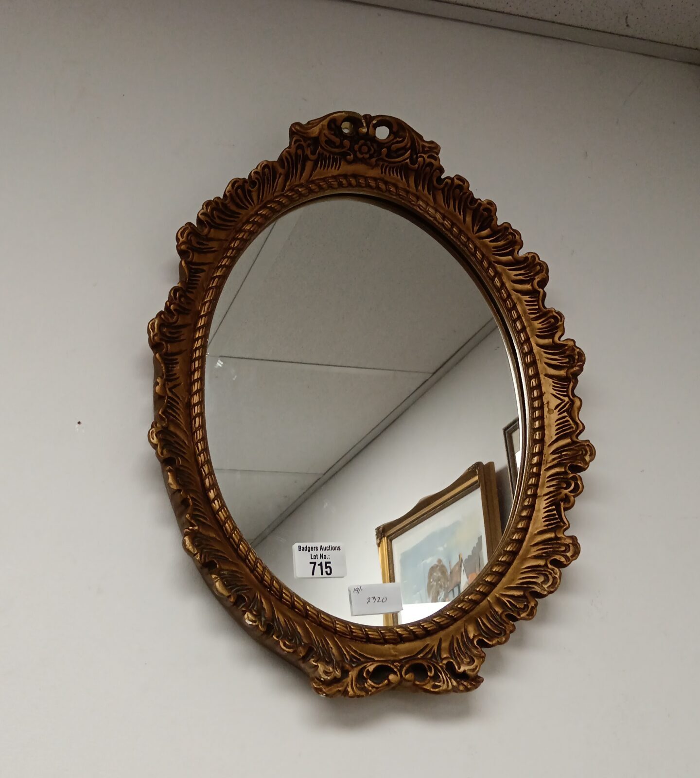 Vintage oval gilt framed mirror