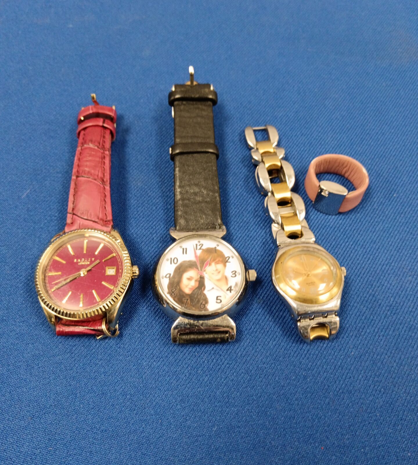 Three ladies watches including radley