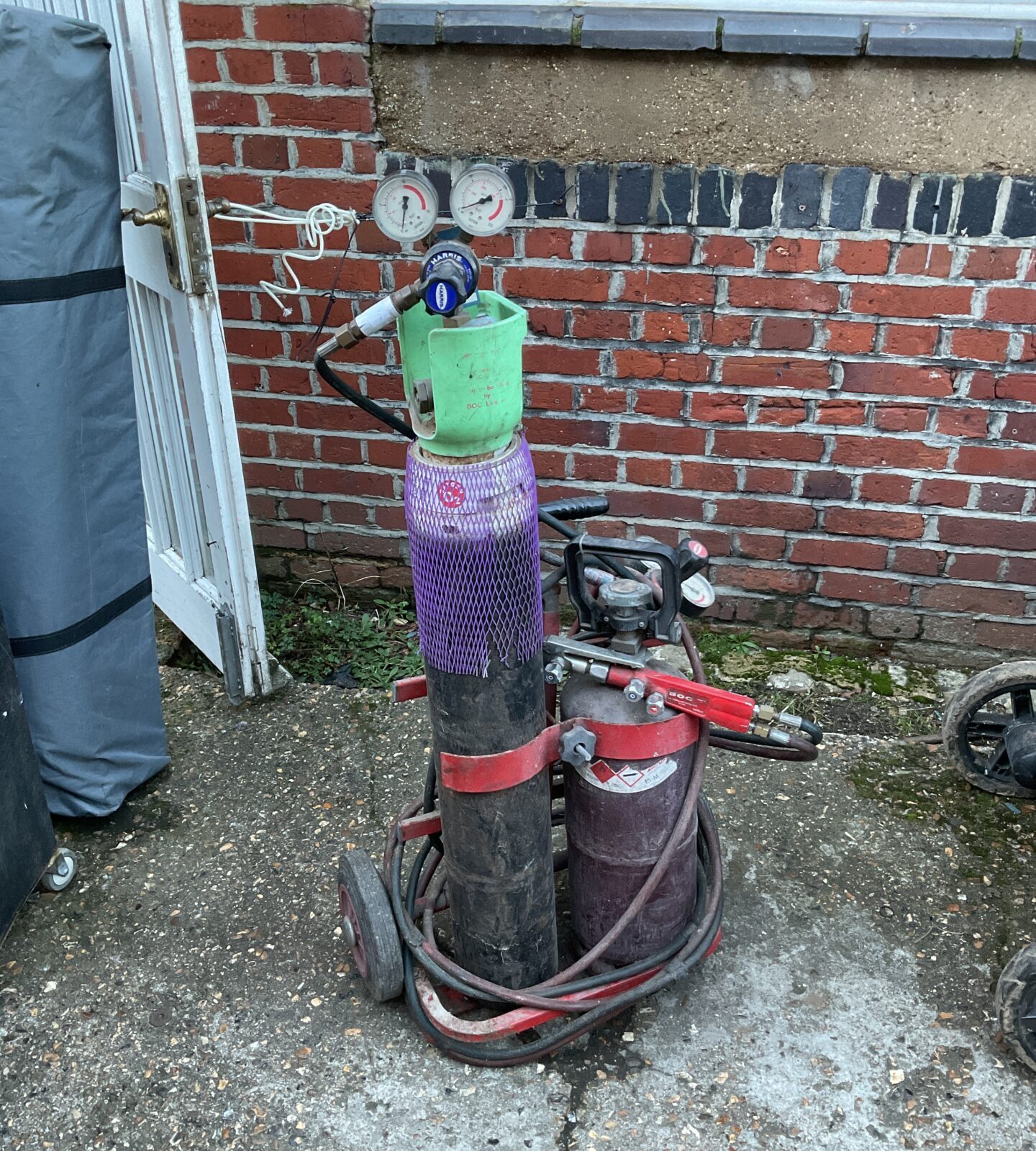 Acetylene torch & gas bottles on wheels