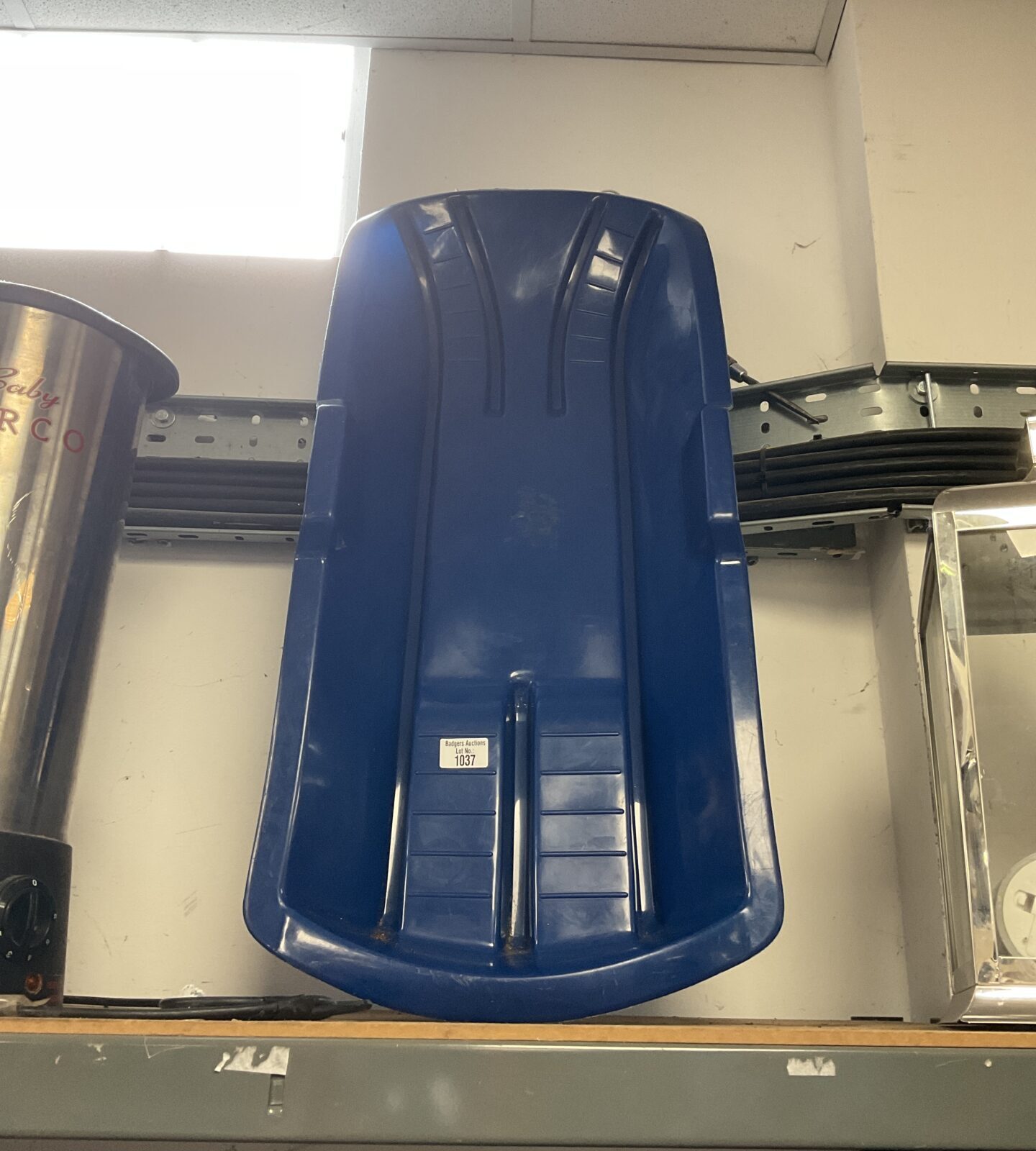 Blue plastic sledge