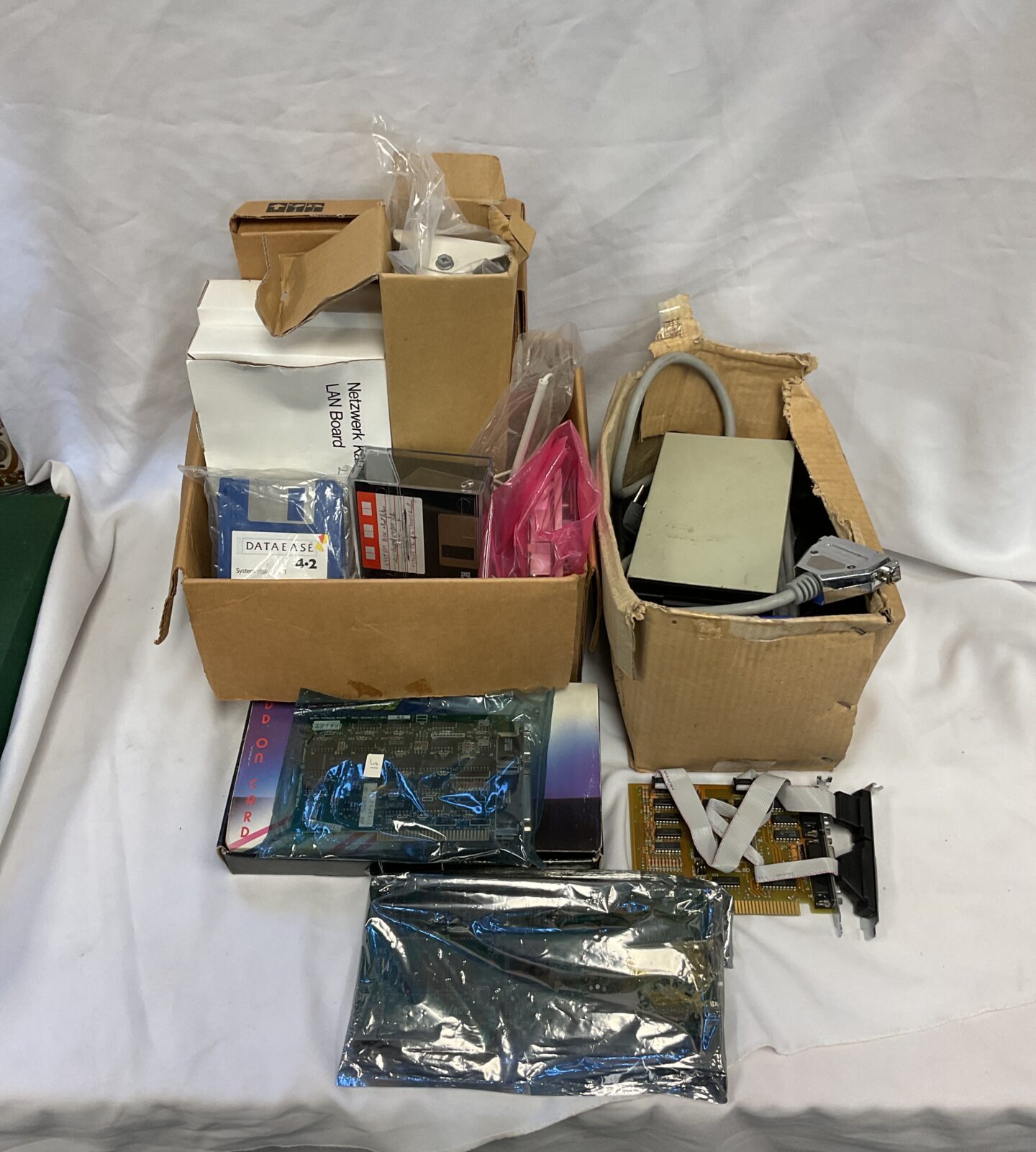 Box of computer hardware including sound & video cards