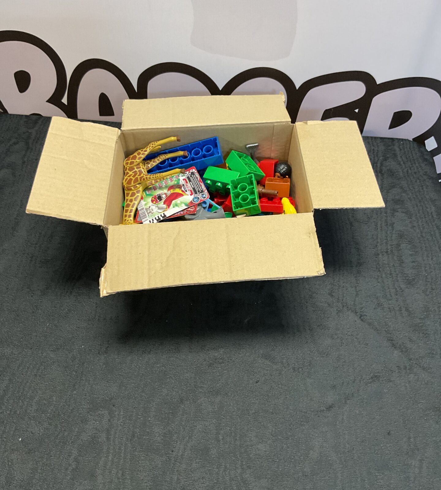 Box of lego duplo and farm animals