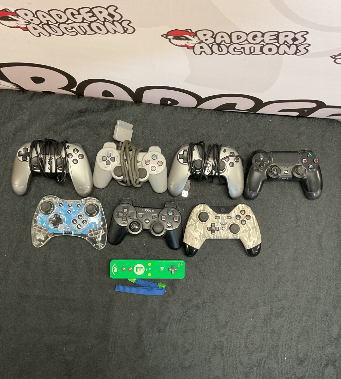 Box of mixed controllers inc ps4, ps3, ps2, xbox and wii