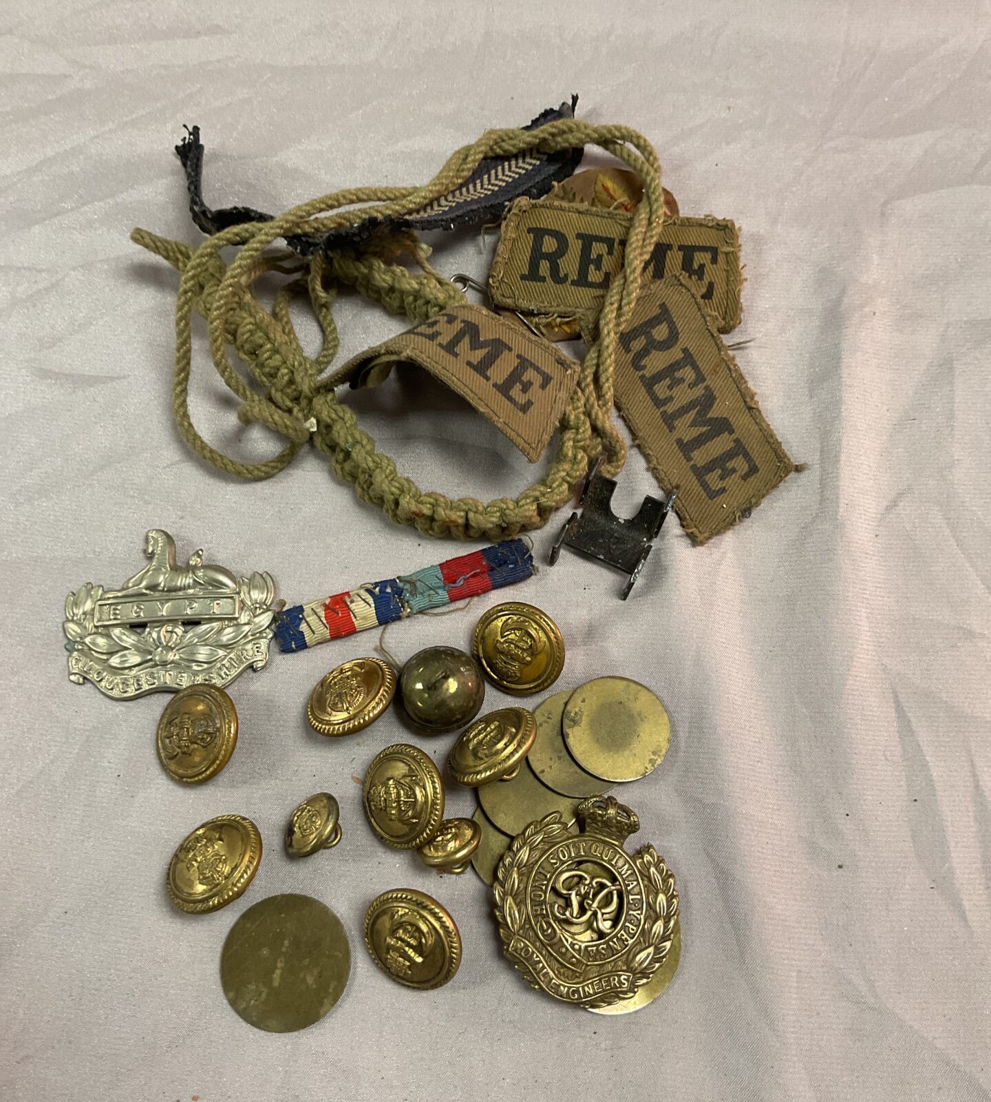 Collection of ww2 British military badges and buttons