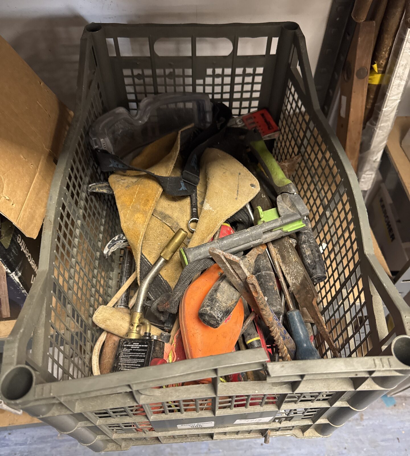 Crate of mixed hand tools