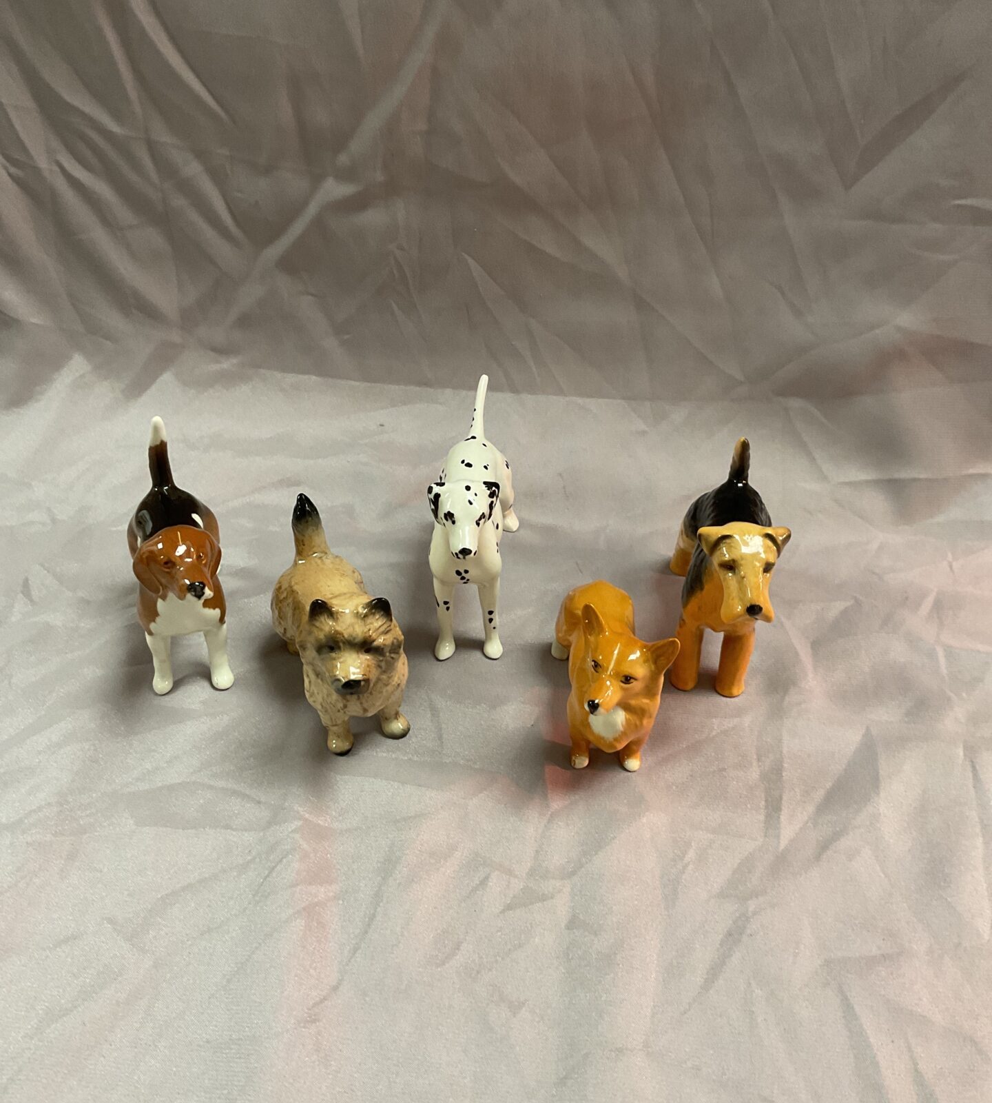 Five Beswick dogs