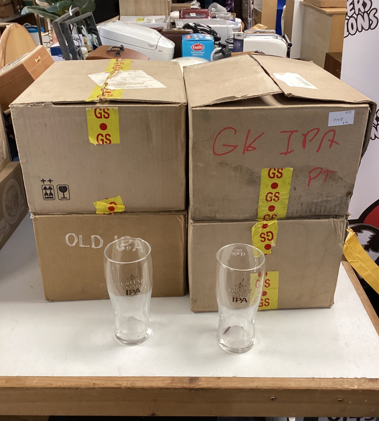 Four boxes of 12 greene king IPA pint glasses