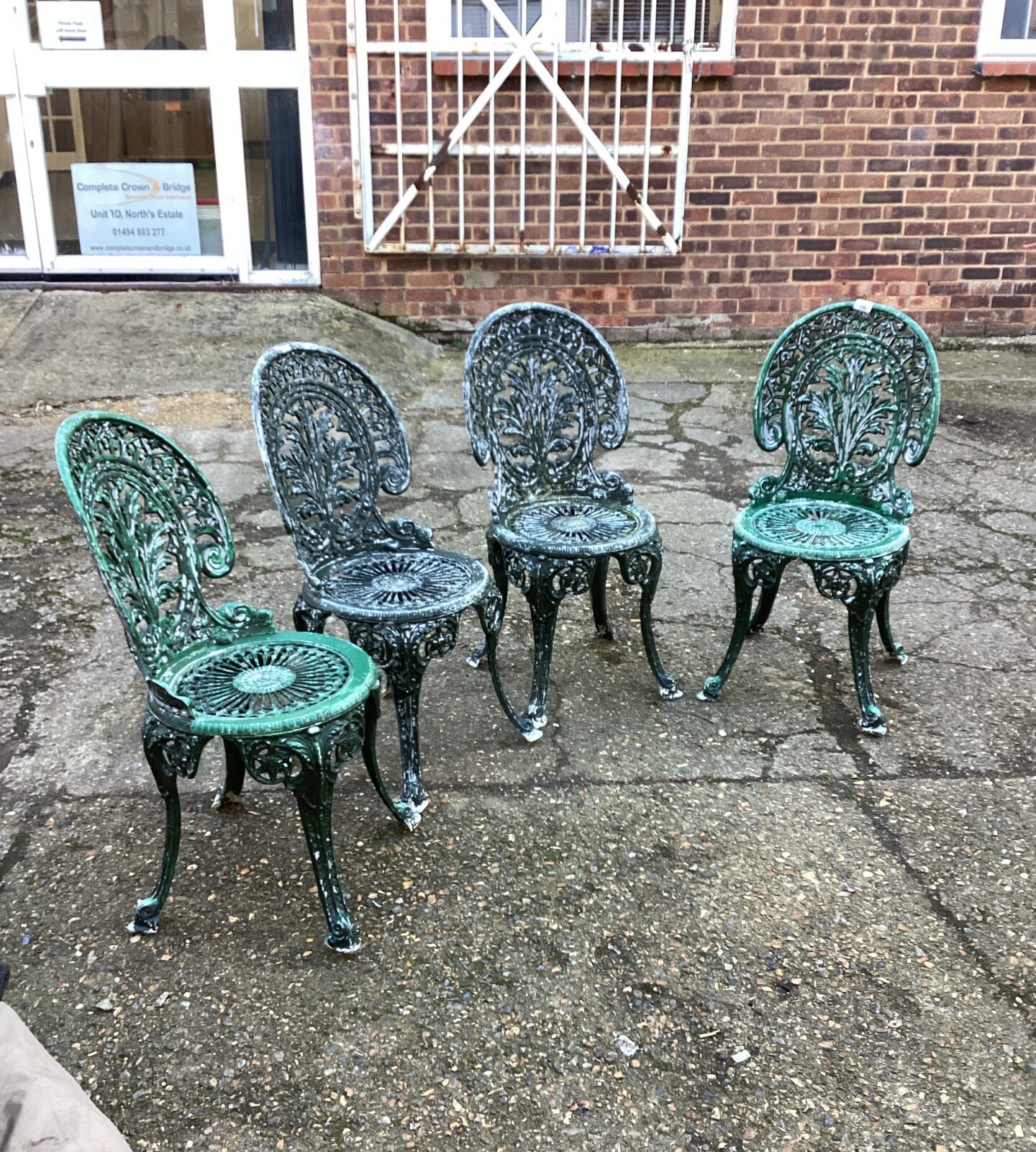 Four ornate metal Garden Chairs