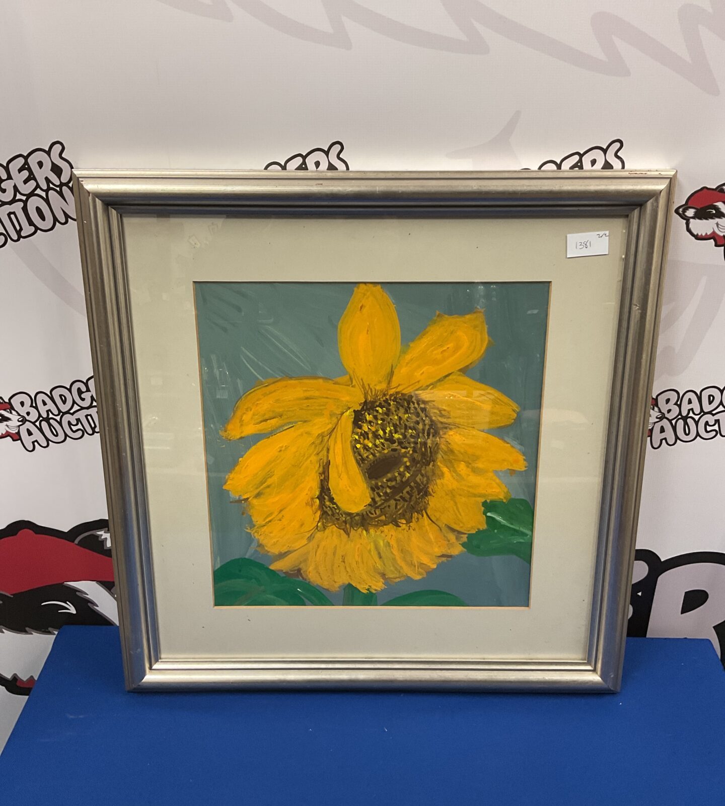 framed watercolour study of a sunflower