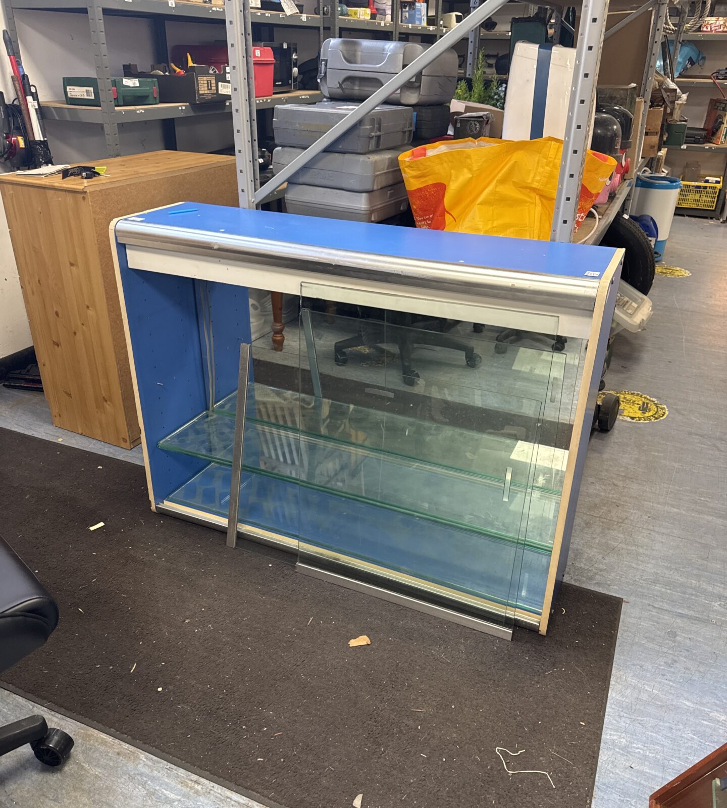 Glass fronted shop display cabinet 47.75” length x 12” depth x 36” height - has marks on it