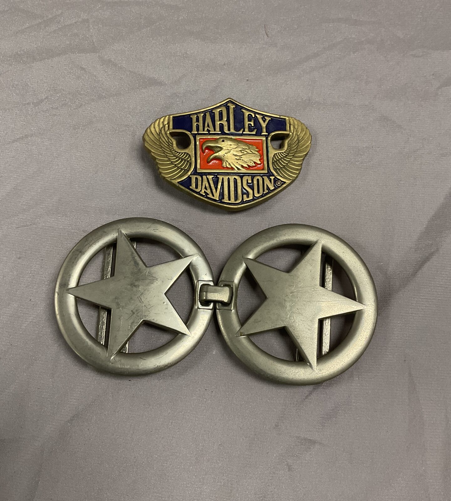 Harley Davidson and Texas lone star belt buckles