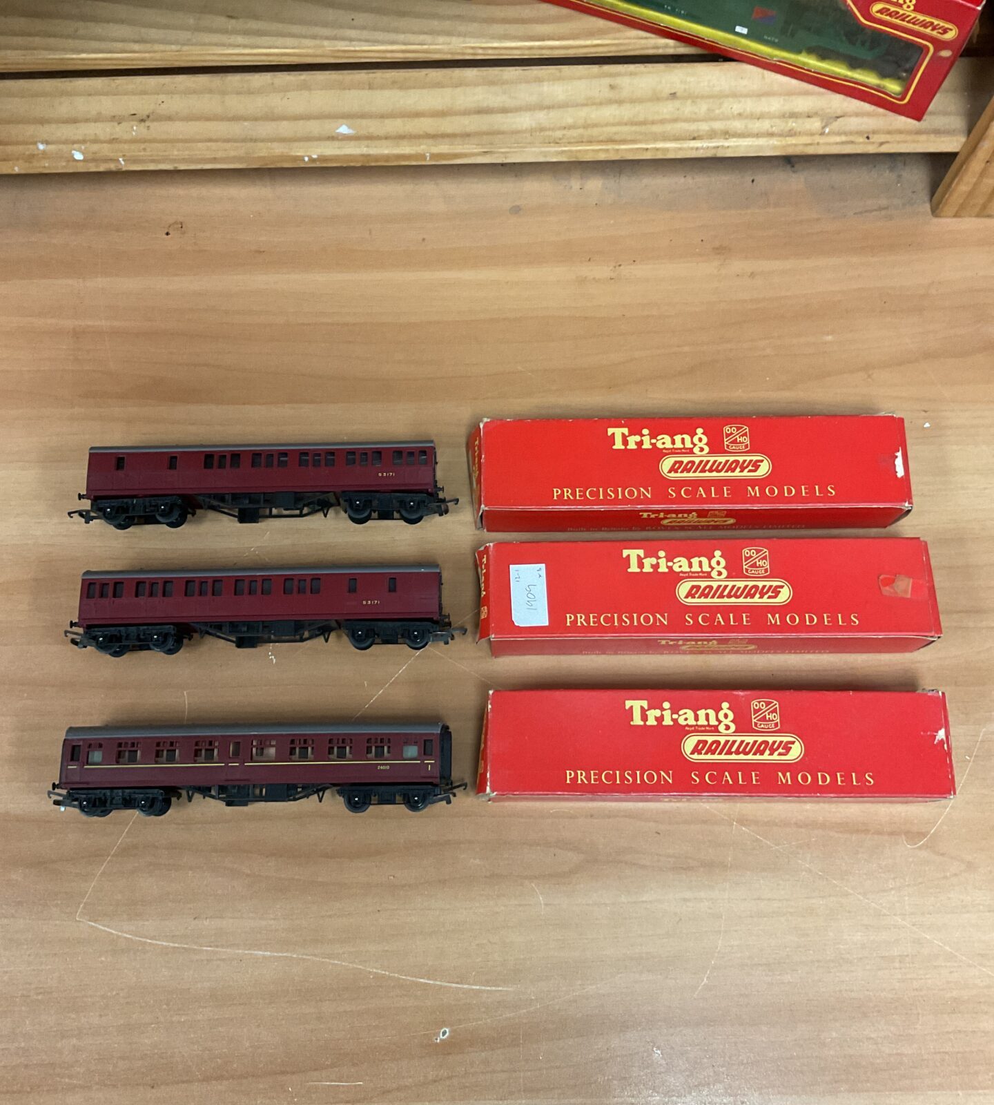 Three vintage triang railways maroon suburban brake coaches