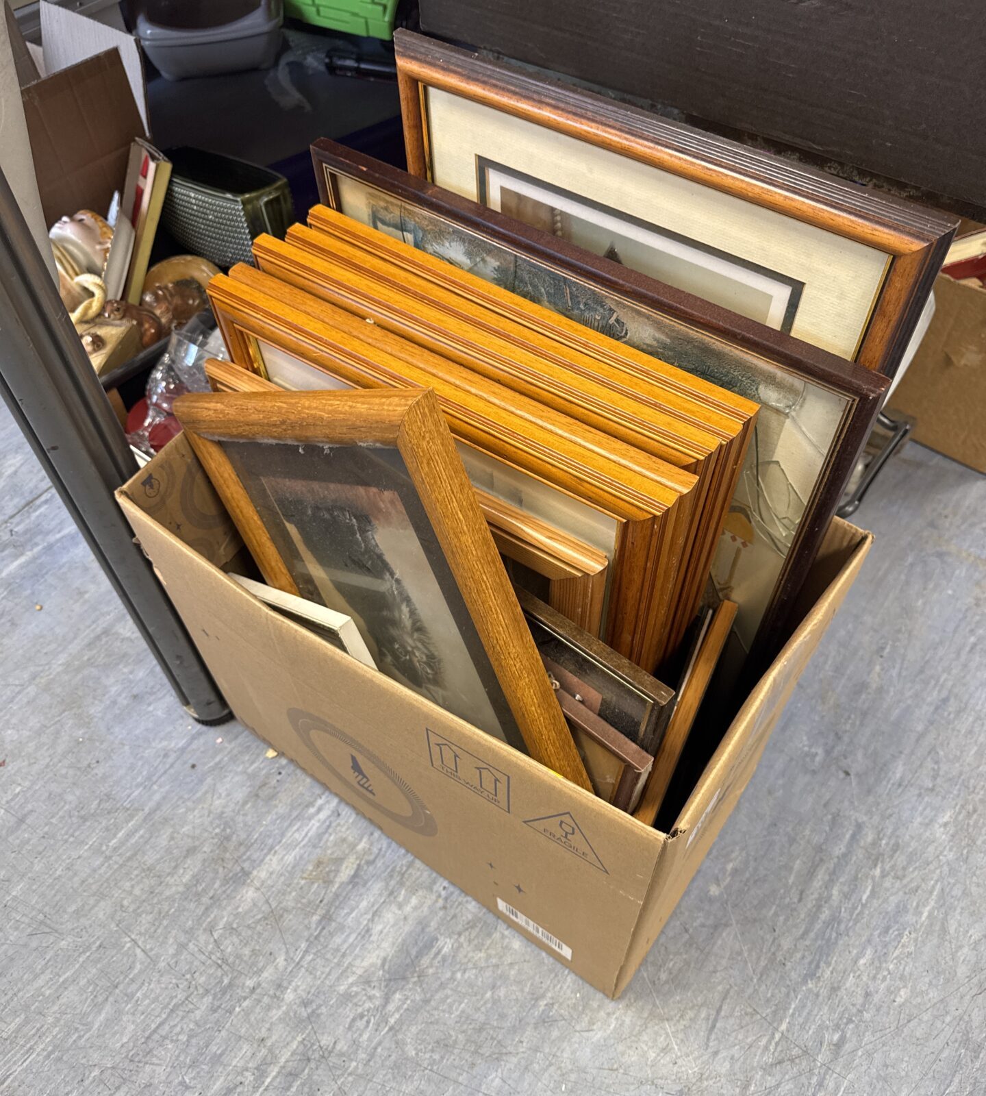 Box of assorted artworks