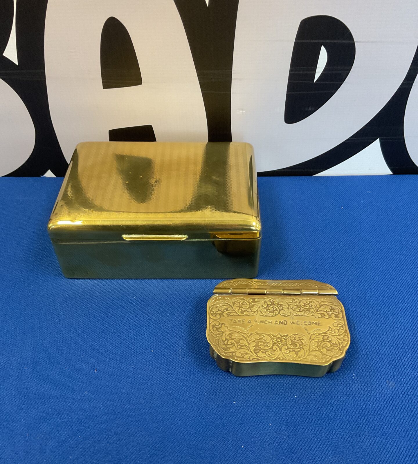 Brass state express cigarette box & brass snuff box