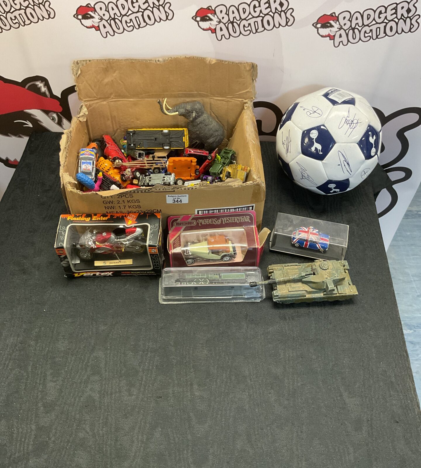 Box of diecast models inc corgi and matchbox and spurs ball