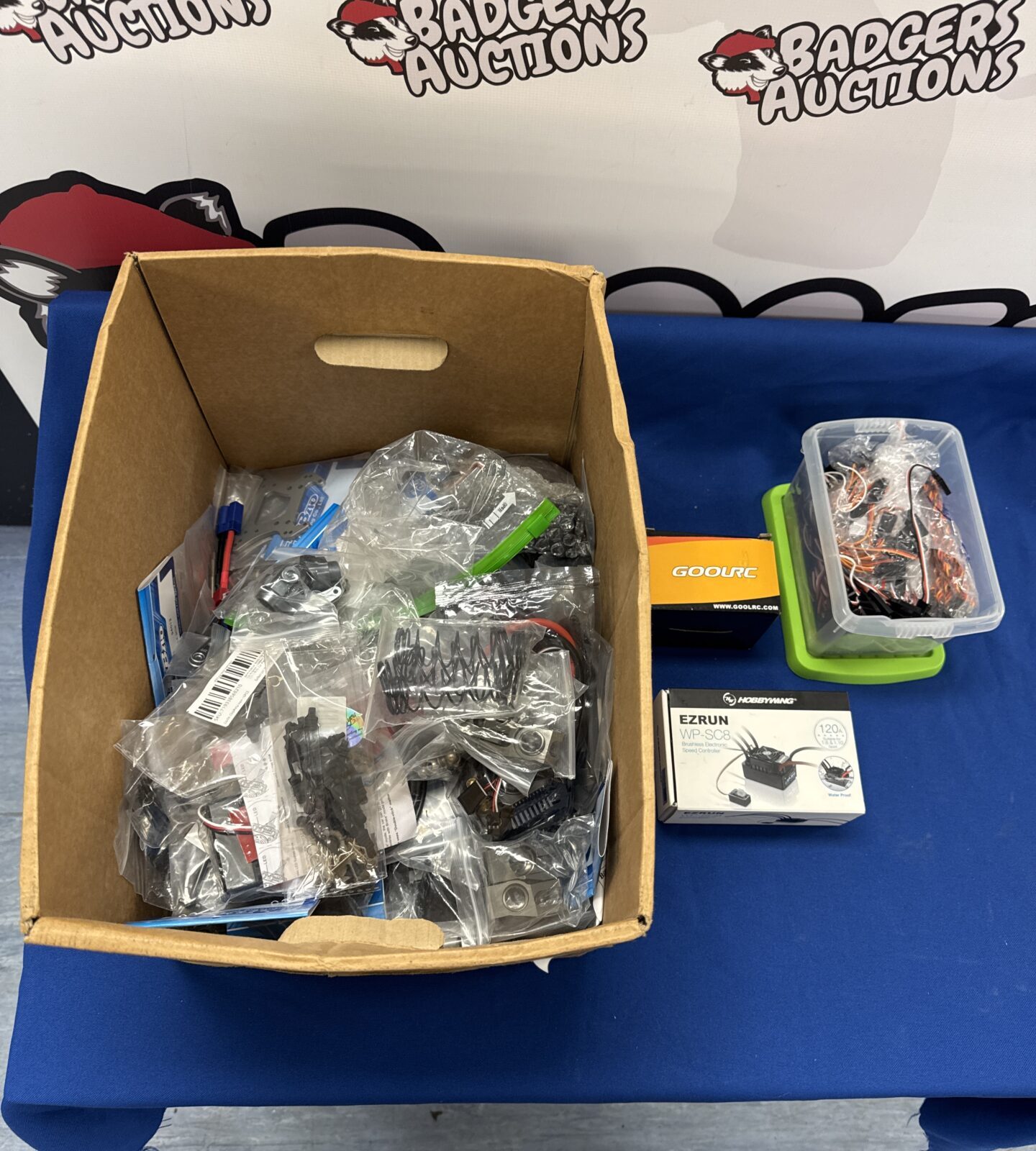 Large box of new rc car parts and accessories