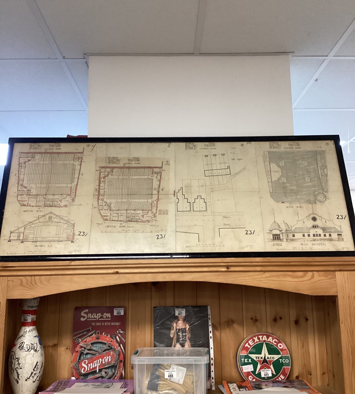 Framed architectural drawings of the queens electric enfeild hall theatre