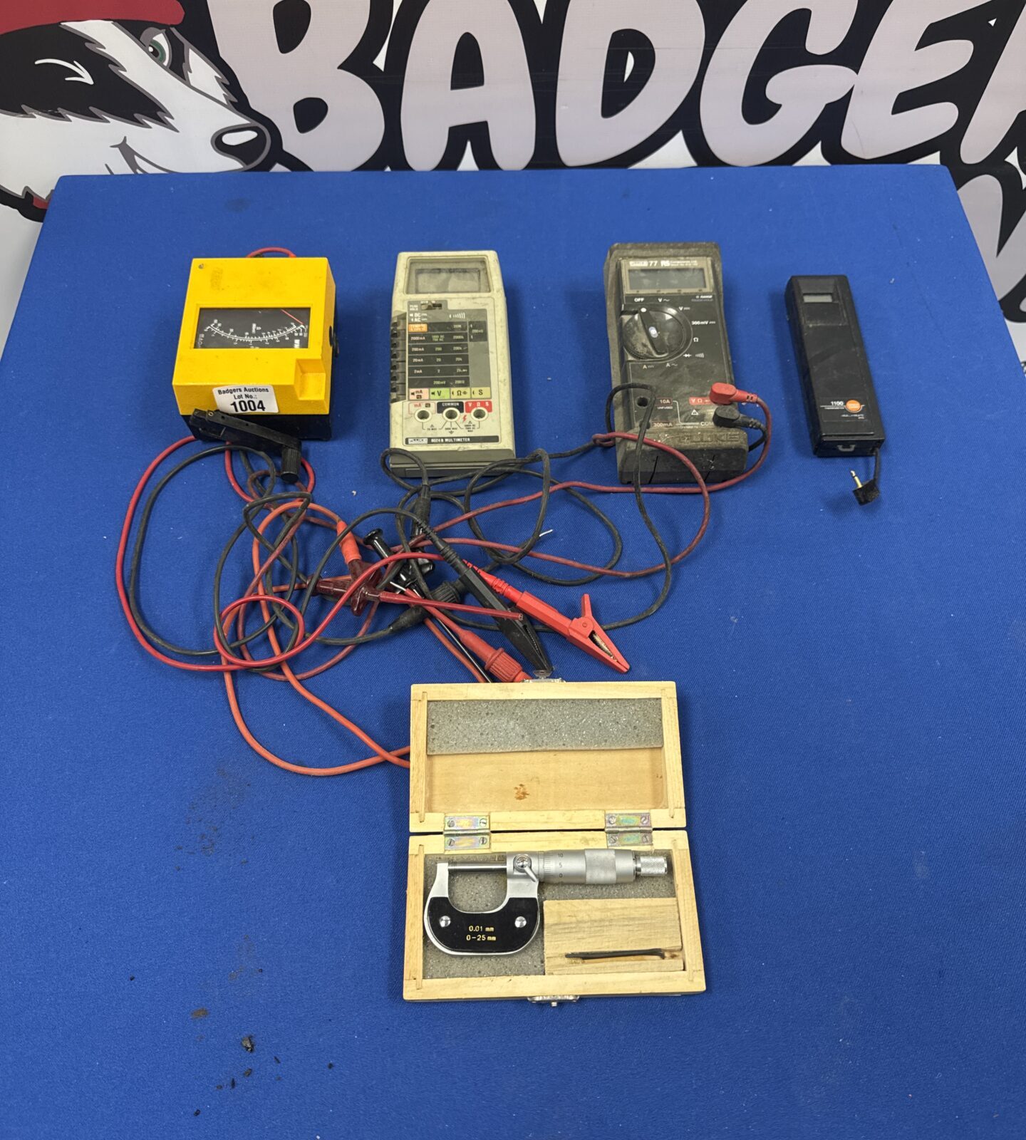 Four assorted untested electrical testers inc fluke with a micrometer