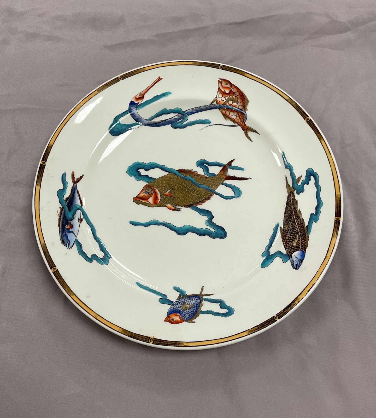 Victorian Royal Worcester Aesthetic movement circa 1877 10 3/8” handpainted plate decorated with polychrome and gilt carp and other fish