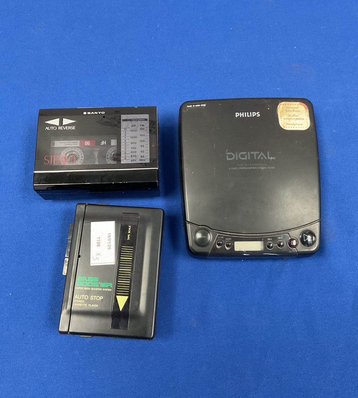 Three cassette & cd walkmans including sanyo & philips