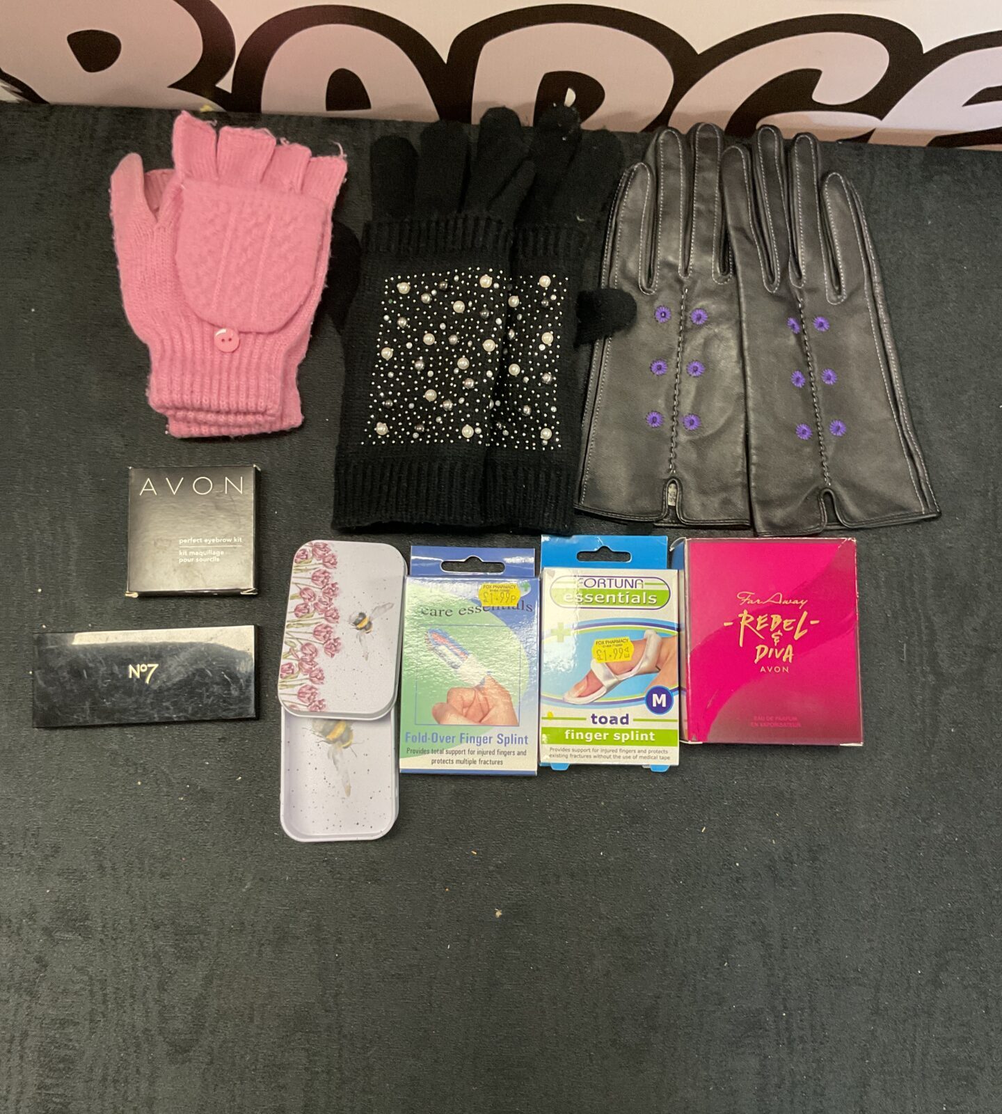 Box of mixed inc gloves, and beauty items inc no7 and avon