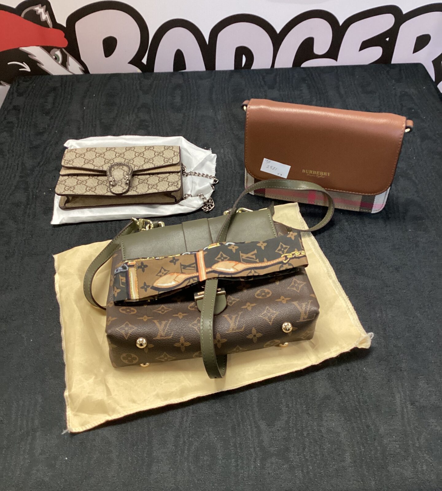 three designer style bags luis vuitton gucci and burberry