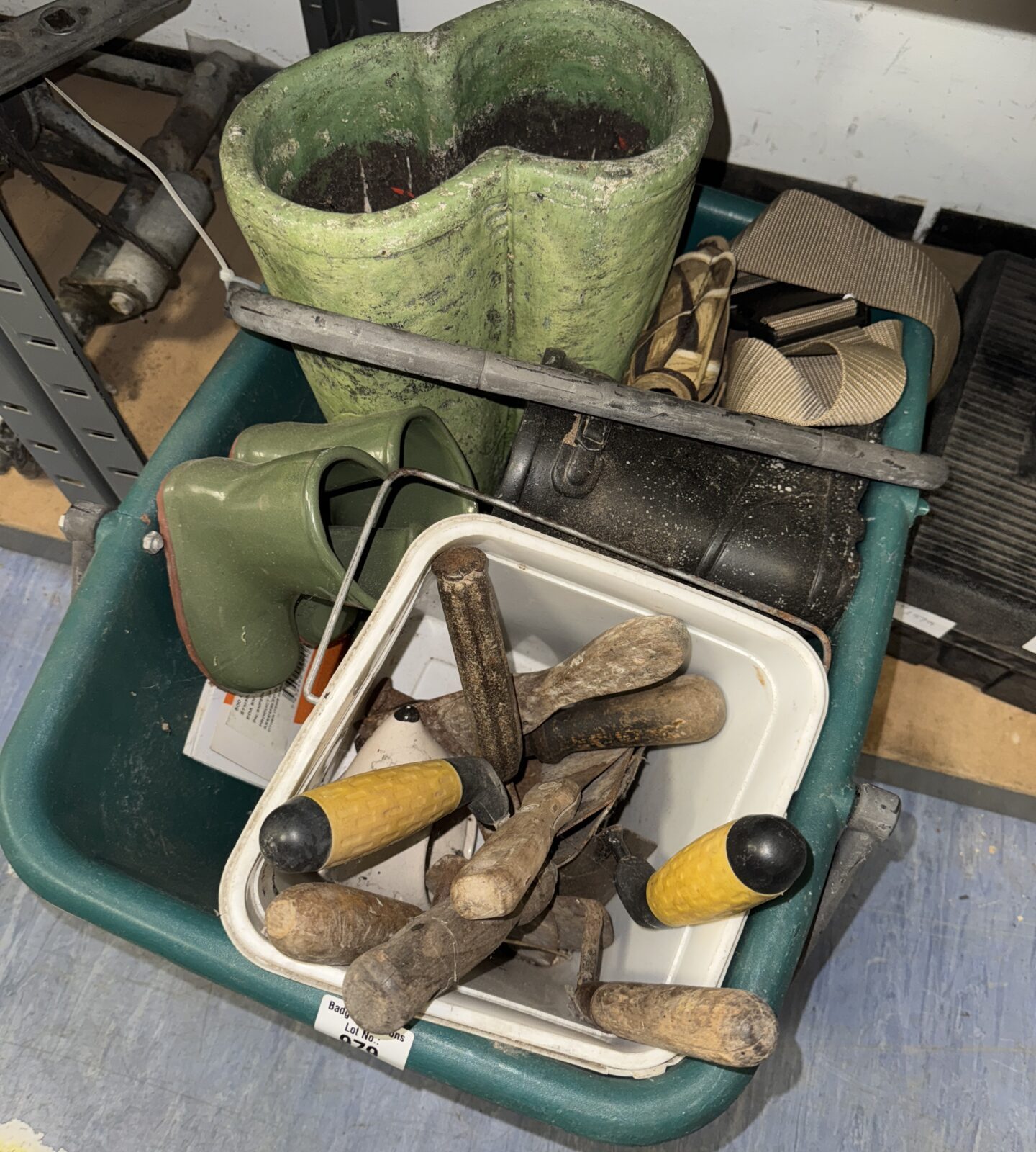 Quantity of welly boot planters with small tub of vintage tools