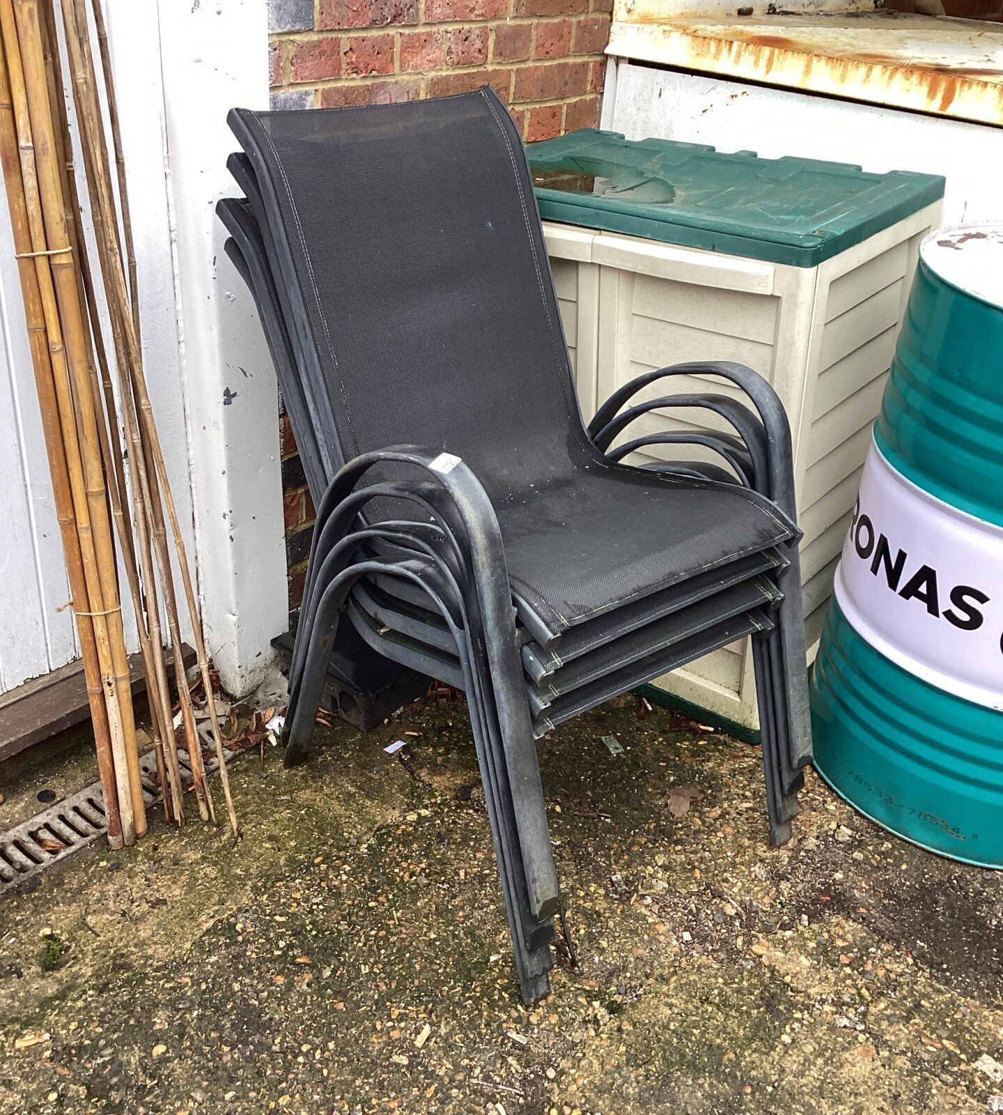 Four black garden chairs