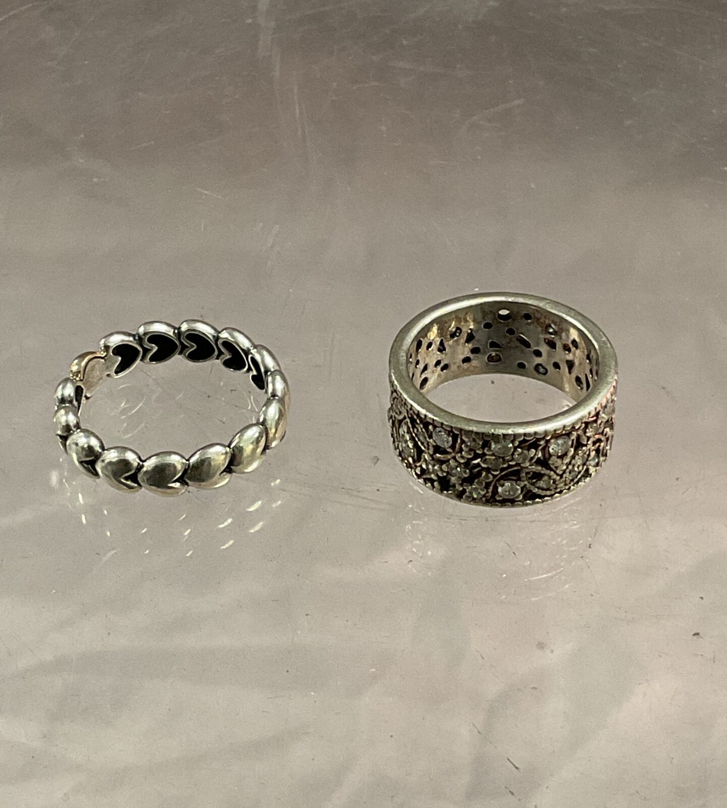 Two 925 silver rings sizes N O