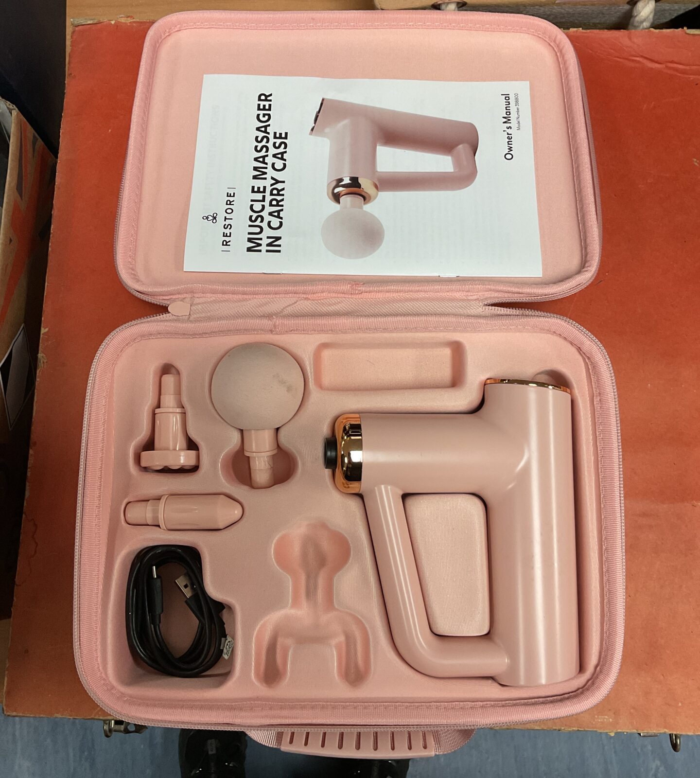 Pink Muscle Massager with attachments tested and working