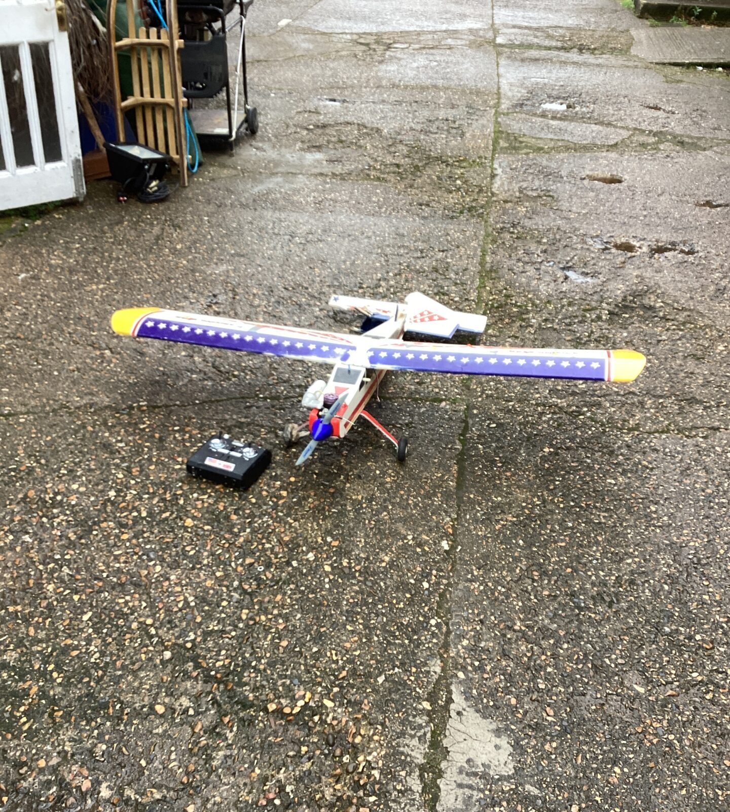 Model remote control Aeroplane with controller in need of restoration