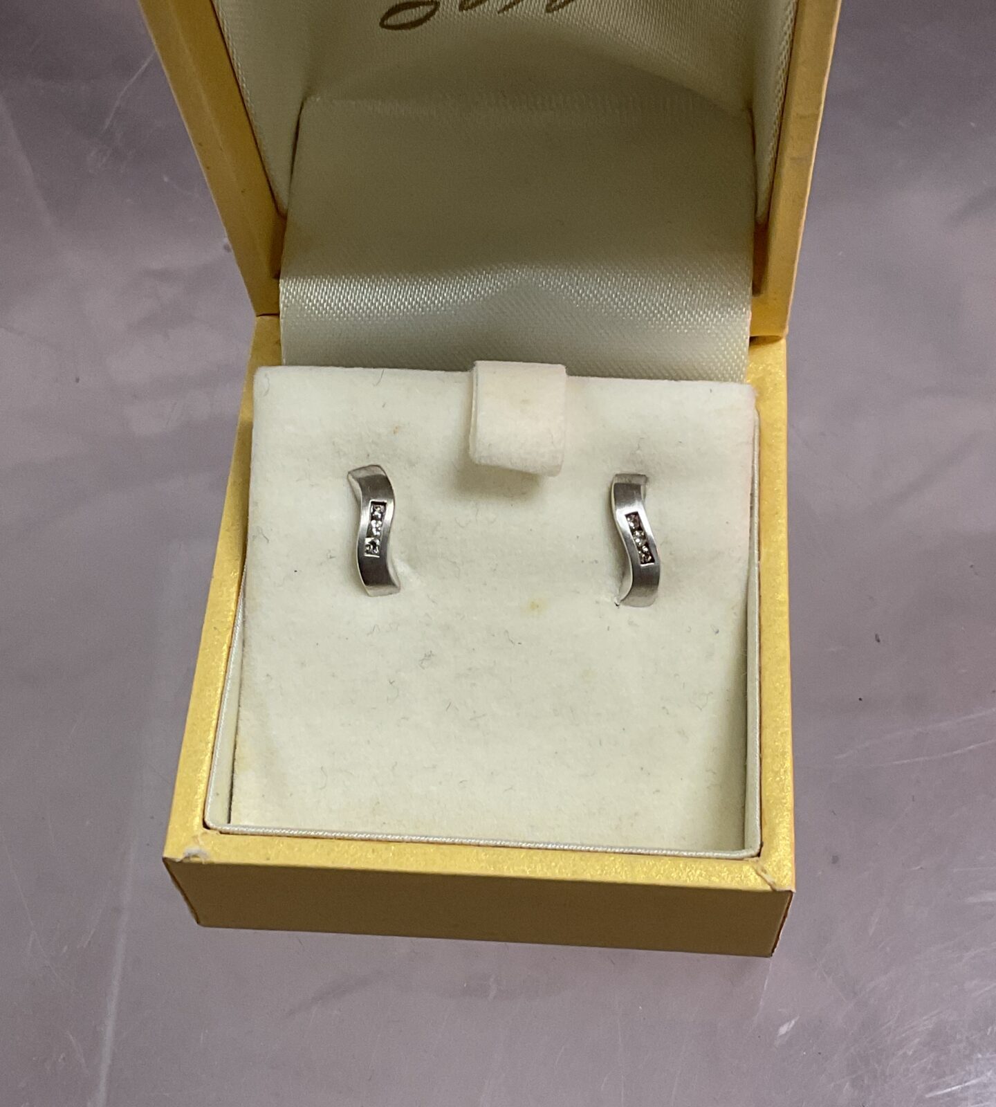 Pair 9ct white gold stud earrings