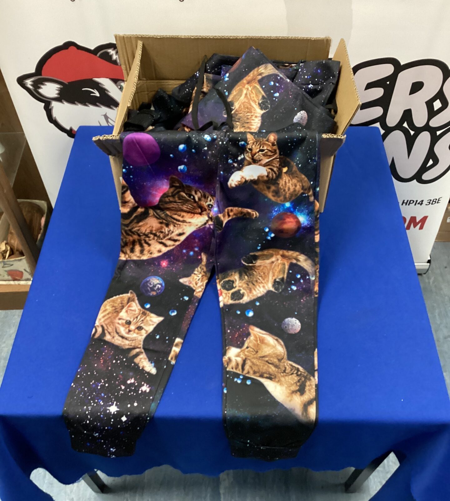 Box of new space & cats kids trousers