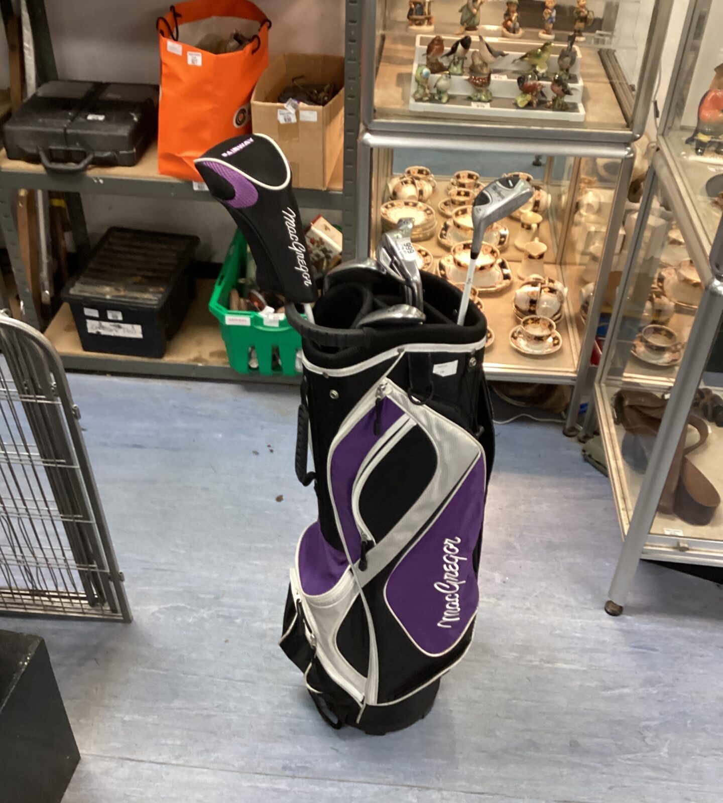 Set of MacGregor golf clubs with bag