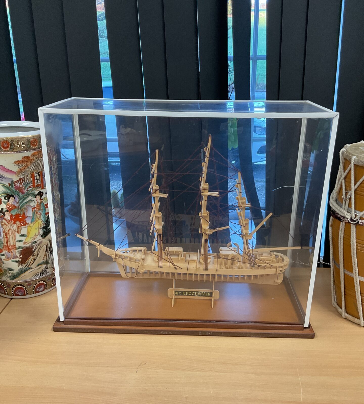 Large wooden model of the cutty sark in display case