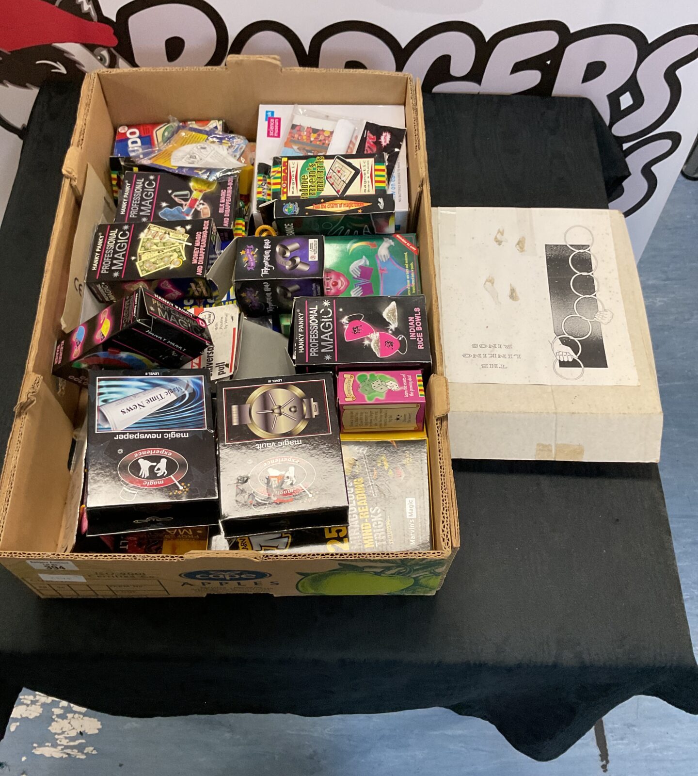 Box of mixed boxed magic toys