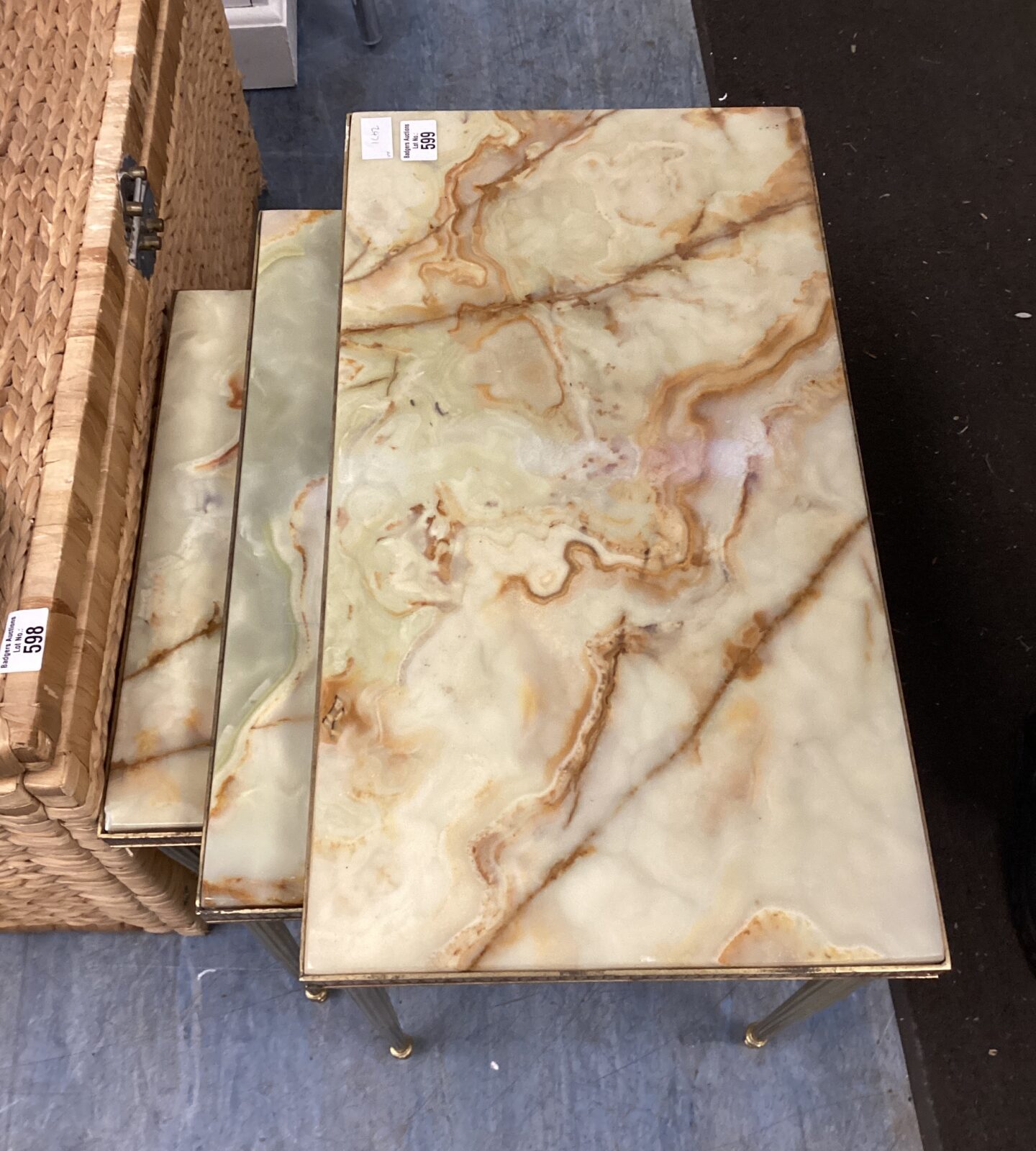 nest of marble topped brass tables